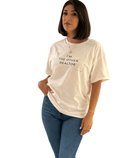 Woman wearing the I'm The Other Realtor T-Shirt, showcasing humor and style for real estate professionals.